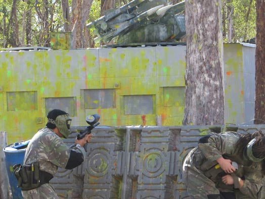 Paintball players fight past the Battle Bunker at Skirmish Samford Paintball